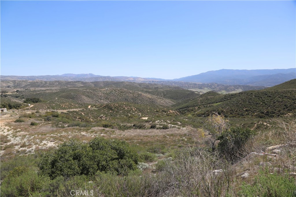 Endless Possibilities on 20.39 Acres – Split-able to 5 ac parcels Off-Grid Getaway Near Temecula!
Discover the potential of this diamond in the rough – a unique 20.39-acre off-grid property offering peace, privacy, and panoramic views! Just 20 minutes from Temecula and near Vail Lake, this fully fenced and cross-fenced parcel is ideal for those seeking space to breathe, play, and create their dream escape. Break down per 5 acres 99,750 X 4 parcels = 399,000 list price.
Highlights include:
A good-producing well with storage tank added value
In-ground pool waiting to be brought back to life
Older manufactured home and outbuilding for restoration or tear down
Pen areas perfect for animals or livestock fully fenced and cross fenced added value
Propane setup area in place
Incredible mountain views and starry night skies
Outdoor enthusiasts will love the dirt roads and abundance of nearby mountain biking trails. Enjoy world-class fishing at Vail Lake and Lake Skinner, or spend your weekends exploring the nearby wineries and charming countryside.
Conveniently located close to the 15 Freeway for easy access to San Diego or beyond. Whether you're looking for a weekend retreat, hobby farm, or off-grid lifestyle, this property is bursting with opportunity.
Don't miss this hidden gem – come see the vision for yourself!