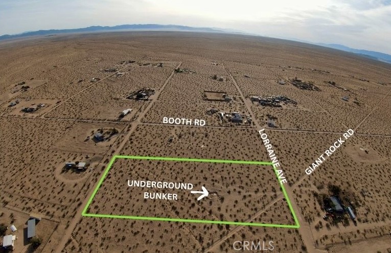 SELLER FINANCING AVAILABLE. Combo deal if purchased with neighboring lot 60396 Lorraine Ave. 5 Acres with Panoramic Views & Underground Bunker Near Goat Mountain & Giant Rock WITH WATER AND POWER IN THE STREET ON THE NORTH AND SOUTH SIDE!
Discover your own slice of the hi-desert with this stunning 5-acre parcel in Landers, California! Located less than 2 miles from the iconic Goat Mountain and under 3 miles from the legendary Giant Rock, this property offers breathtaking panoramic views with Goat Mountain as a dramatic backdrop.
Adding to its unique appeal, this lot features an underground bunker, providing a secure and private space. The bunker is equipped with an air recirculation system, making it an ideal option for a variety of uses, from a storage shelter to a creative retreat.
Enjoy the peace and tranquility of the Mojave Desert while being conveniently close to some of the area’s most beloved attractions. You're less than 10 miles from the famed Integratron, the unique Giant Rock Meeting Room, the exquisite Gubler Orchids nursery, and the popular La Copine restaurant. Whether you're looking to build your dream desert retreat, establish a weekend getaway, or invest in a prime piece of land, this lot offers endless potential.
With wide-open skies, stunning sunrises, and mesmerizing stargazing opportunities, this property is perfect for those seeking adventure, serenity, or a creative escape.
Buyer to verify availability of all utilities. All lot lines are approximate, buyer to use due diligence to verify.
Don’t miss this rare opportunity to own a unique piece of Landers magic! Contact us today for more details