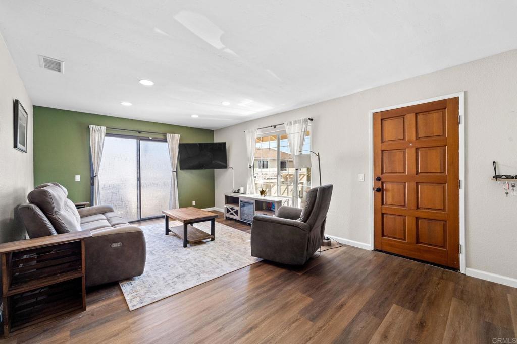 The perfect combination of comfort and convenience in the heart of Santee. Walk to shopping, coffee shops/restaurants, gym, trolly, all just steps away. Updated 2 bd, 2 ba with granite counters, SS appliances, in unit laundry and large master suite with walk in closet. Second floor unit has a nice size balcony, no one above, and garage below -plus an additional dedicated parking spot. Plenty of guest parking throughout the complex, community pool, affordable HOA fees, and VA approved.