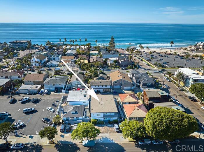 MOONLIGHT BEACH APARTMENTS!! STEPS TO THE SAND! FULLY FURNISHED 1 BEDROOM APARTMENT AT THE MOONLIGHT BEACH APARTMENTS. Location matters! Experience the best that Encinitas has to offer from this bright, steps to the sand, 1922 renovated beach cottage. This cottage features a charmingly modern and relaxing decor that is great for an extended vacation or working holiday. It's an ideal location that is one block from the famed Encinitas dining district and just two blocks in either direction from both Moonlight Beach and The Coaster Rail, which gets you anywhere in San Diego quickly. Welcome to Encinitas, San Diego's Gem! Just steps away from Moonlight Beach. Surfer's paradise!! Available by the month. Gorgeous remodeled 1 bedroom furnished home. All hard surfaces new custom vinyl flooring. Large bedroom plus pull-out in living room. Lots of built in storage in bedroom and hall. Ceiling fans in bdrm and living room. Newly remodeled bathroom. Gas stove, refrigerator, granite counter tops, and brush nickel fixtures. Great breezes. End unit with no one above or below. New cabinets. Assigned parking spot in community lot and on-street parking. Community laundry on-site. Barbecue area for residents. No pets please.
