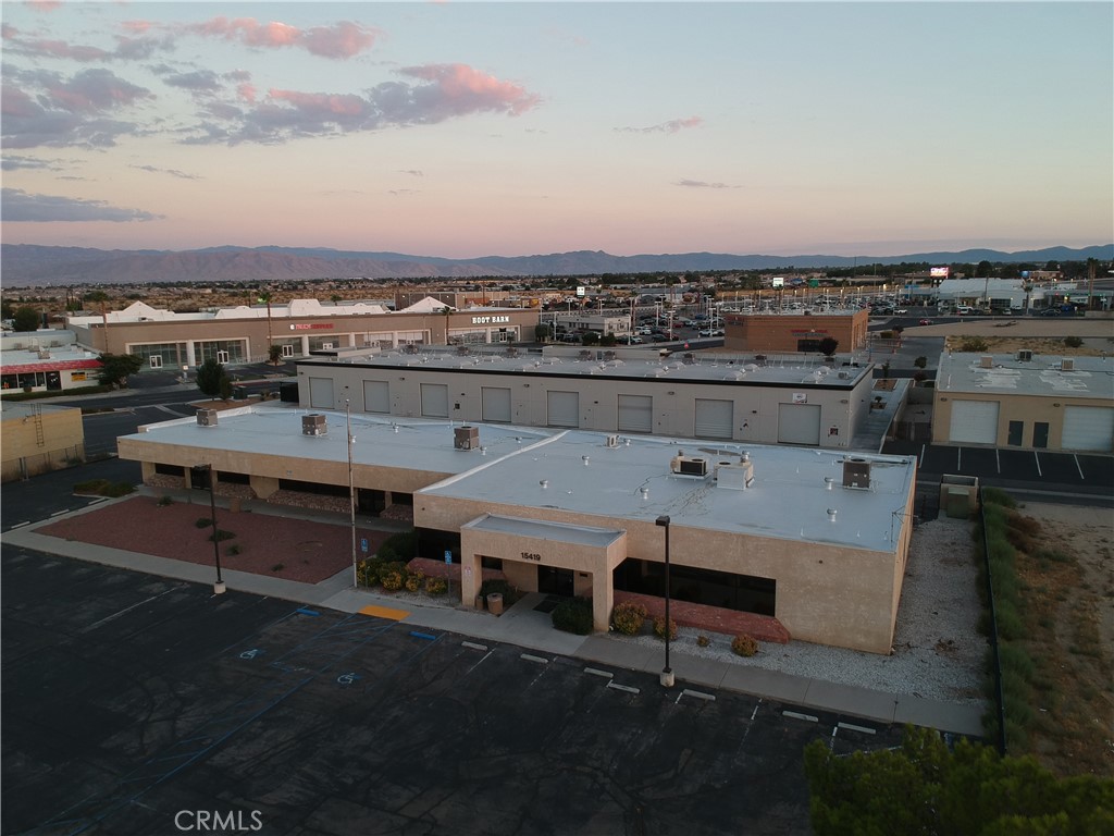 For Sale Commercial Office Building with long term tenant in place. Current 6.83% Cap. Property boasts 6 offices (1 with private restroom), 3 larger rooms, 1 employee break room, 2 storage rooms and 4 restrooms with large open areas across a total of 8,312 SF on a 0.92 AC Lot. Built in 1982 with an effective year of 1995, the property is professionally managed with mature landscape and ample parking both front and rear. Property is occupied by County of San Bernardino affiliated entity. Located in the City of Victorville's IPD Zoning, the property is in good condition and in a great location right off the I-15 freeway off and on-ramps. This investment provides a great return within an opportunity zone that does not come available very often. Selling As-Is. Buyer to verify all. DO NOT DISTURB TENANT.