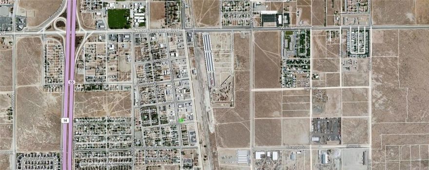 Rare Commercial corner lot at the northeast corner of Diamond & Elm in Rosamond. All utilities available. Could be good for a drive-through coffee shop or use your imagination. Buyer to do their own investigation on uses.