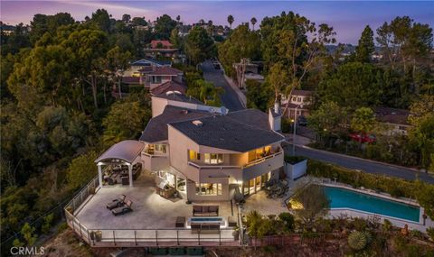 Photo of 1121 Roberto Lane, Bel Air, CA 90077 (MLS # OC24127402)