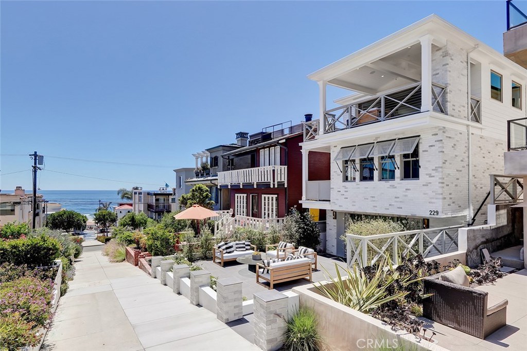 229 8th Street is a collective blend of builder talent, design experience, and beach-living inspired architecture. Designed by Waterleaf and executed by TriWest while being located in a bullseye location with simple access to downtown Manhattan Beach, the pier, and the water make this home a true gem. This walk street home has south facing exposure which is favorable for more sun and has big views with open simple living spaces with a neutral design palette. In the heart of a classic coastal neighborhood, this location is a nucleus for family and friends. Relaxed but refined, crisp but inviting, the casual elegance of this purposeful environment embraces an active beach life where sun, sand, ocean breezes, and memories are closely interwoven.