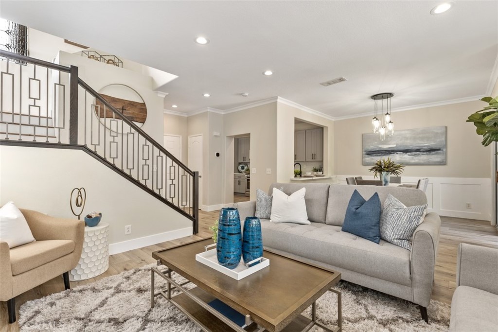 Model perfect townhome in the heart of beautiful Coto De Caza, walking distance to tennis and golf! The largest floor plan in the community with hard-to-find 4th bedroom/office. Remodeled throughout, the kitchen and spare bathrooms have been tastefully upgraded with the current trends and stainless appliances. Notable features include new wood-look flooring, new LED lighting, new inside paint, solid surface counters, custom fireplace surrounds, plantation shutters, pavers in rear yard, and the list goes on! Large driveway and oversized backyard for the neighborhood add to the appeal. Guard-gated Coto De Caza is renowned for its privacy and amenities, including 2 private country clubs, golf courses designed by Robert Trent Jones, equestrian trails, and parks. Highly ranked public and private schools. Close to shopping and restaurants directly across from tennis and racquet club. Current tax rate approximately 1.02% and no mello roos.