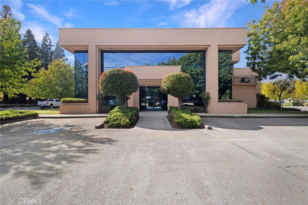 One of the most prominent office buildings in Chico, CA, 500 W. East Avenue, is now vacant and available for sale. This well-known stately building offers a sweeping two-story glass exterior with a recently remodeled interior. Located on one of the main thoroughfares in Chico, this building has great access to both Highways 99 and 32, and is situated in an area dominated by medical and professional office users including Enloe Medical Center which has plans for a 120,000 square foot expansion four parcels east. The building contains approximately 4,150 square feet of two-story office space consisting of waiting and reception areas, multiple standard and executive offices, conference room, break room, open workspace, storage, copy room, and back office areas. Also included is the approximately 3,000 square foot attached conditioned warehouse space with roll-up door, dedicated AC units, gas heater, office space, storage rooms, mezzanine space and sinks. Additional facilities include a second floor patio off of the conference room, private garage with automatic garage door, and an 88-panel fully owned roof-mounted solar panel system. This building would be suitable for a user requiring a flex-space operation with ability to potentially expand the office area in the future. The building is well parked with 28 spaces and the property has been very well maintained