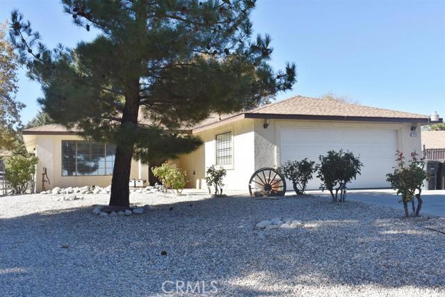 Location, Location, Location!!! On a paved cul-de-sac road and perfectly priced, this Phelan home has it all! This well loved home features 3 bedrooms, 2 full bathrooms, 2 car garage and a great 1770 sq. ft. floor plan. Close to schools, parks, shopping and Hwy 138, the exterior features a fully fenced and crossed fence rear yard, drip system throughout with special grow areas, mature pine and deciduous trees, and pull around RV access. Inside, plantation shutters, newer stainless steel appliances, whole house fan, newer furnace, hot water heater and water softener as well as a nice sized Master Suite with walk-in-closet, large rooms and indoor laundry room help complete your amazing High Desert home. The backyard features a concrete patio for entertaining with trellis and 220 electric, vinyl fencing, pristine storage shed, and is neatly tucked away with ample privacy. This rare find in one of the best areas of Phelan is perfect for a loving family wanting to escape the busy city and plant their roots! Association Amenities: None, Beach # of RV Spaces: 0NONE,BEAC Lot Location Type: Standard Location Landscaping: Partial Special Features: None # of Attached Spaces: 2 # of Detached Spaces: 0