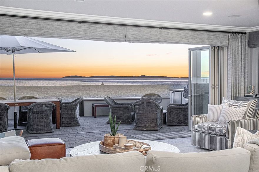 Timelessly designed, this custom oceanfront home is ideally positioned on a stretch of beach with nothing to come between you and the ocean except the sand. Designed with the utmost quality of craftsmanship and material, this home encompasses 4 bedrooms and 4.5 bathrooms, including an office/5th bedroom. Recently remodeled, this home consists of a main level which boasts an open concept design for the ultimate indoor-outdoor living experience. Top of the line Thermador appliances, a center island with prep sink, quartz countertops, two additional refrigerator drawers, ice maker, ample cabinetry and pantry. Large dining area that overlooks the great room, fireplace and gorgeous sit down views. La Cantina doors open to the spacious front patio with bbq, fire pit, and dining table. Perfect to entertain and enjoy the views and sounds of the crashing waves. The 2nd level consists of a luxurious master suite, large sitting area, fireplace and a wall of bi folding doors that capture unbelievable ocean views. The spacious master bath includes dual vanities, walk in shower, jetted tub and expansive walk in closet. Additionally, two ensuite bedrooms, outside deck space with jacuzzi complete the 2nd floor.  The 3rd floor is dedicated to two additional bedrooms in addition to a TV bonus room, La Cantina doors open to a huge deck complete with an outdoor BBQ, sink cooktop and fridge & fireplace This stunning home comes completely furnished with custom designed furniture. Truly a 10+++