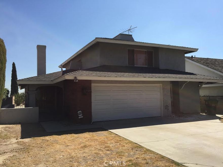 Great view of the city lights. Home boasts a large, spacious kitchen and a first floor bedroom.  This property has lots of potential for families, multi-generational families and/or investors. Home is sold in its as is present condition. It is truly priced to sell quick! No warranty's expressed or implied. Quiet friendly neighborhood. Close to 60 freeway, near Montebello Mall.  All appliances and furniture (except the piano) are included in the sale price (Note: home is central air ready).