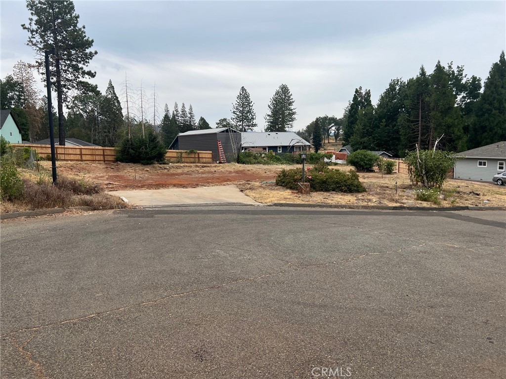 Permits approved, paid and ready for the new construction! Include plans for 2007 SqFt home 3 bed 2-1/2 bath, 2-car garage, and RV access. Water paid and connected; account is current. PGE account started. Located in a quite court in upper Paradise. Convenient location close to Skyway, Clark Rd , Pentz Rd.