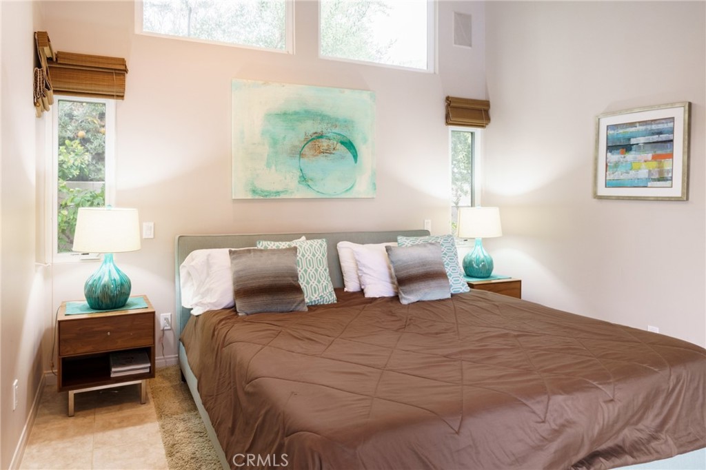 This double-butterfly Krisel-Palmer masterpiece was featured in 2016 Modernism Week. Available May 8, 2025.
NOW ACCEPTING RESERVATION FOR LEASE STARTING June 2024. Minimum one month. Special rates for summer rental and multi month rentals.
The moment you arrive at The 28 Palms Oasis, you are welcomed by a simple yet elegant landscaped entryway. Walking through the front door, you enter into the Great Room with an intimate conversation area by a sparkling fireplace, a cozy Media Center to the left and elegant Dining Area to the right. The Dining Area connects to the newly remodeled Chef’s Kitchen and a Bar Area with a built-in wine cooler. The main house boasts 4 well-designed bedrooms that all open to the outdoors with gorgeous views plus 3 recently remodeled bathrooms. All bedrooms are separated from the main living areas, entitling guests the peace and privacy they deserve. The Casita with separate entrance includes a king sized bed, spacious new bathroom and a kitchenette with a refrigerator and a microwave.
Walking out to the spectacular backyard, you see plenty of fruit trees, various desert plants, and 28 gorgeous palm trees, hence the name of the estate. At the center of this desert paradise is a large recently refurbished rare, tiled pool with a new integrated spa. Outdoor shower. Weber BBQ. There are numerous sitting and lounging areas throughout the property. Please pour yourself a drink, sit down, relax, and look up to the open blue sky framed by those impeccable palm trees and the majestic San Jacinto Mountains. Take a deep breath ... Welcome to your private oasis.