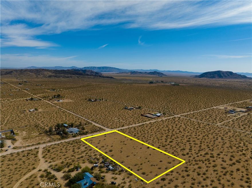 Seize the opportunity to own a remarkable 2.3-acre parcel of land at 56785 Encantado Rd, Landers, CA. This level and usable piece of property offers a blank slate for your desert vision, nestled in the serene environment of San Bernardino County.

The land is beautifully flat and fenced with chain link, making it ideal for a desert retreat or to build your dream home. Utilities appear to be available in the street, and there is a power pole and fire hydrant conveniently positioned at the edge of the property, adding an extra layer of convenience and safety.

Situated not far from the renowned Joshua Tree National Park, this location provides easy access to its breathtaking desert landscapes and unique rock formations. Additionally, the picturesque Big Bear Mountains are just a short drive away, offering year-round outdoor recreational opportunities.

Enjoy the peace and privacy of a rural setting while remaining connected to nearby amenities and services. This property represents a fantastic chance to create a private retreat or make a savvy investment in an area with natural beauty and adventure at your fingertips.