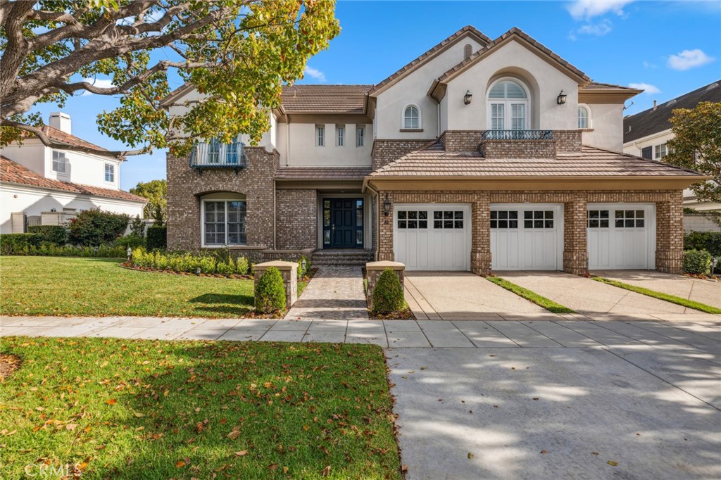 Tucked away within the prestigious enclave of One Ford Road, this stately home is primed to stand as a showpiece estate in one of Newport Beach's most idyllic neighborhoods. Encompassing over 5,100 square feet and boasting 5 bedrooms, it presents the largest floor plan in this highly coveted neighborhood. Meticulously maintained, this home awaits your personal modern touches, offering a pristine canvas for customization. Step through the formal entry foyer, adorned with a graceful winding staircase, into a realm of refined living. Entertain guests in the formal dining room or unwind in the comfortable living room, complemented by an adjoining music room or study. The primary suite indulges with his-and-hers walk-in closets and two retreat areas, ideal for private gyms or offices. Each room is generously proportioned, ensuring ample space for comfortable living. Outside, the picturesque backyard unfolds across an expansive 10,000+ square foot lot. Residents of this exclusive 24-hour guard-gated community enjoy access to two swimming pools, a cutting-edge gym, clubhouse, putting green, croquet and sport courts, as well as a vibrant calendar of community events. Embrace the opportunity to make this enduring residence your cherished sanctuary for years to come!