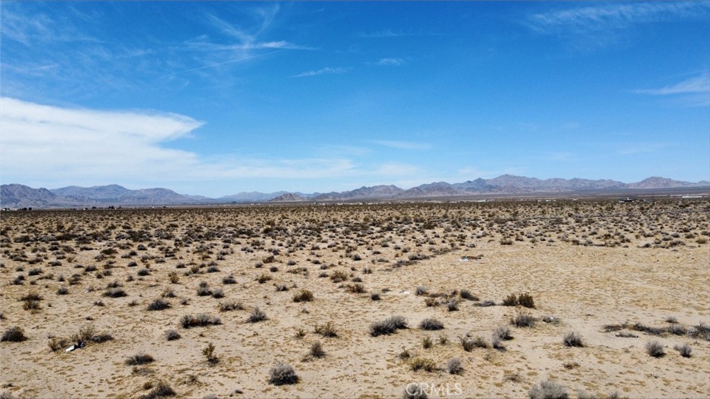 Welcome to your desert oasis! Build your dream home or bring your RV, tiny house, or desert toys for the perfect retreat.
This 2.5-acre flat parcel is conveniently located right off the paved road and offers endless possibilities. The area is well known for private water wells and septic systems, allowing you to be fully self-contained on your own beautiful piece of land.
Enjoy stunning, wide-open views and peaceful surroundings—perfect for anyone looking to escape the city and embrace desert living. Great opportunity to create your own slice of paradise!
GPS Coordinates 34.503071 -116.859589