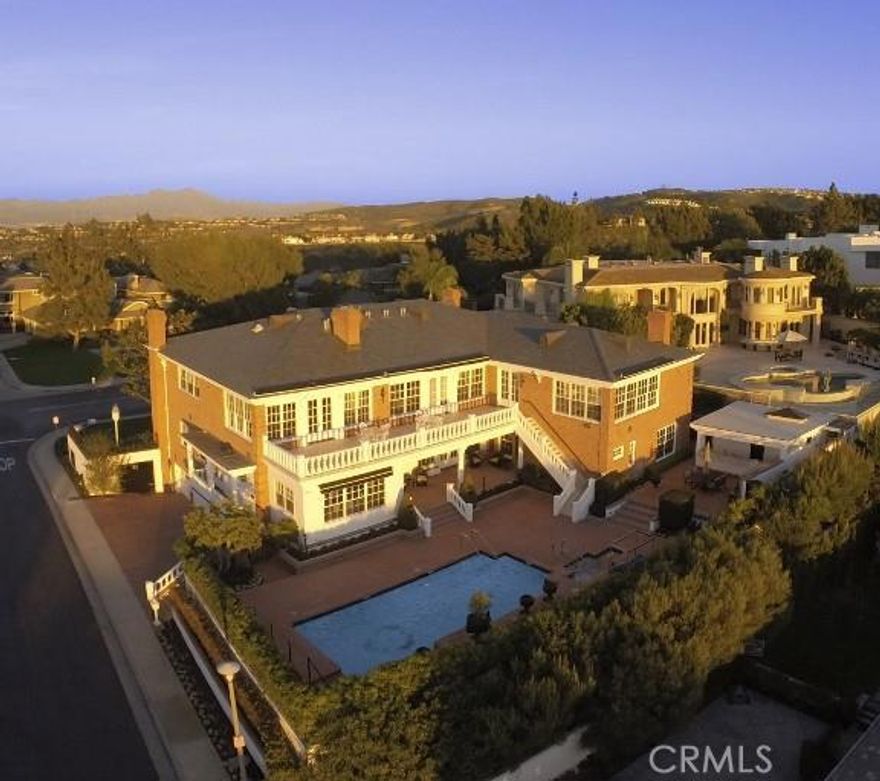 This exquisite seven bedroom estate in prestigious & guard gated Harbor Ridge offers unparalleled luxury, an abundance of privacy & spectacular views. A grand foyer welcomes to the main level, comprised of a handsome library, family room & a masterfully crafted gourmet kitchen with an abundance of Sub-Zero & Viking appliances. Additional elements of the main level include a separate wing consisting of four bedroom suites; two additional bedroom suites are found on the opposite side of the home. The spacious backyard offers stunning views, pool & spa, outdoor kitchen, lush gardens & a casita. The second level features the elegant formal living room, with French doors to the terrace, an oversized formal dining room & a fully equipped caterer's kitchen. The spacious master suite is complete with a beautiful fireplace & an ultra luxe master bath. Completing the second level is a media room with theatre style seating, a secondary office & a game room. This magnificent home is equipped with a large subterranean level, which offers a gym with its own hot tub & bath, oversized laundry room & a four car garage. Additional amenities of this distinct home include an elevator, separate staff access, a commercial grade generator & an outdoor children&#8217;s playhouse.