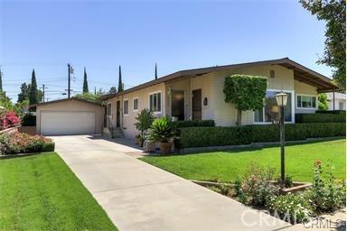 LOCATION, LOCATION!! Lovingly maintained by one owner, this south Redlands home is light and bright. It is immaculate and features updated kitchen and baths with solid surface counters, newer appliances, a roof that is 3 yrs new, dual paned windows, as well as newer water heater and central heat/AC. This 2 bed/2 bath home is situated on a quiet street in an established neighborhood with a generously sized backyard. The large inviting pool, built-in BBQ, patio cover, garden area are perfect for your next gathering. The original hardwood floors are under the carpeting in most rooms of the house. Association Amenities: None # of RV Spaces: 0 Special Features: SHNONE Lot Location Type: Standard Location # of Attached Spaces: 0 # of Detached Spaces: 2