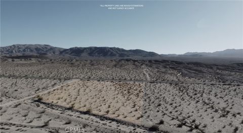 Photo of 11 JOSHUA Drive, 29 Palms, CA 92277 (MLS # PW24224665) Photo of 11 JOSHUA Drive, 29 Palms, CA 92277 (MLS # PW24224665)