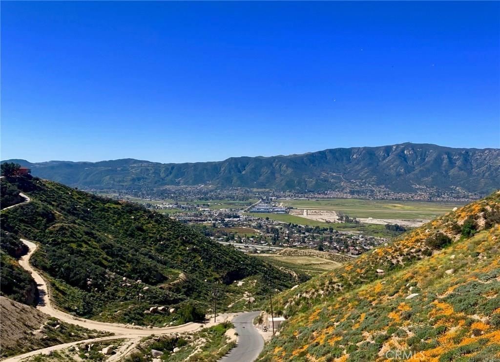 Welcome to the top of the world with panoramic views of Lake Elsinore, Ortega mountain range, Mount San Gorgonio along with surrounding colorful hills and valleys. Beautiful place to develop your dream home filled with privacy looking over all of this beauty. Majority of the 13.30 acres are hillside so bring your imagination ( and tractor) to create the perfect place to call home.
Buyer to verify property lines and markers (if any) along with existing easements for satisfaction.