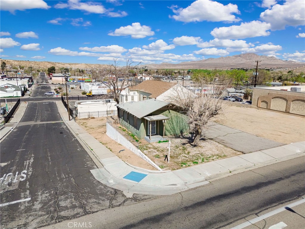 PRICE REDUCED!! Unlock the potential of this expansive 14,200 SF retail-zoned lot, ideally situated in a high-traffic area. Featuring a 561 SF structure ready for customization, this property offers endless possibilities for your business vision. Conveniently located near Highway 18, Historic Route 66, and the I-15 Freeway, ensuring maximum visibility and easy access for customers. Don't miss this incredible investment opportunity in a rapidly growing commercial hub—schedule a viewing today!