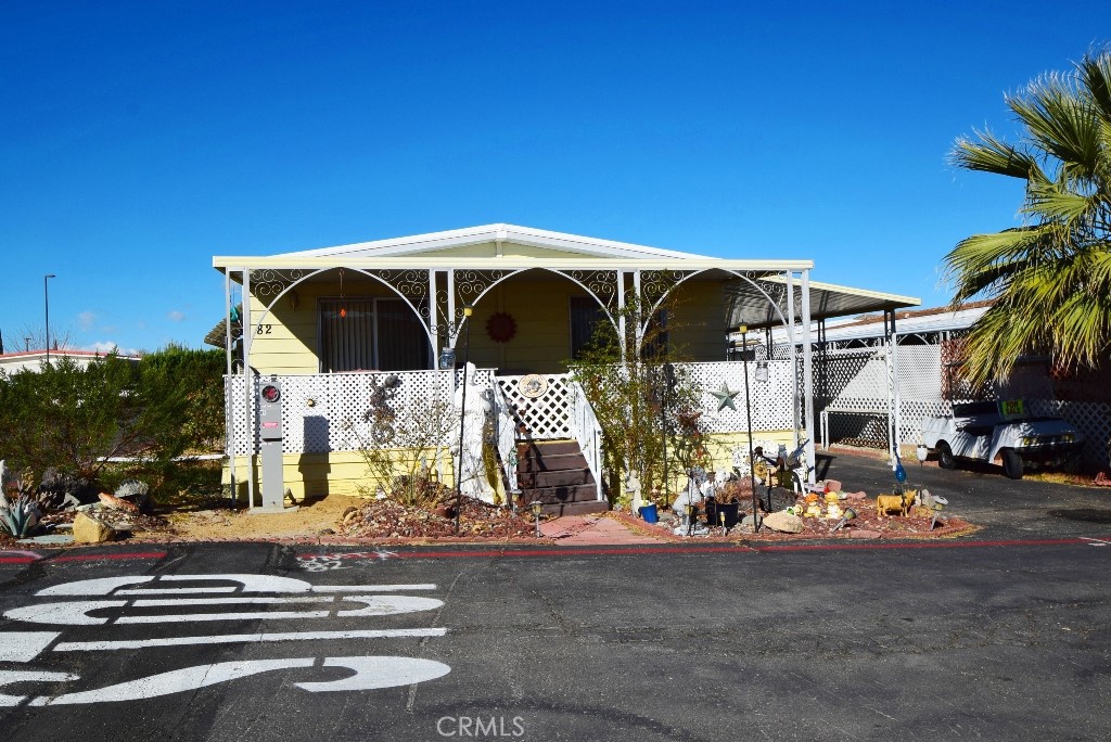 MOTIVATED SELLER! Enjoy serene desert living in this charming 2-bedroom, 2-bathroom double-wide mobile home, located in a peaceful, well-maintained 55+ gated community in beautiful Yucca Valley. Bright, open concept living room and dining area, perfect for entertaining, master suite with ensuite bathroom, fully equipped with appliances, plenty of cabinet space, in-unit laundry room with washer/dryer hookups, private patio space and small yard for relaxation and gardening. Located just minutes from downtown Yucca Valley, you’ll have access to shopping, dining, medical services, and beautiful outdoor adventures like Joshua Tree National Park. Affordable Desert Living in a Secure, Friendly Community!
