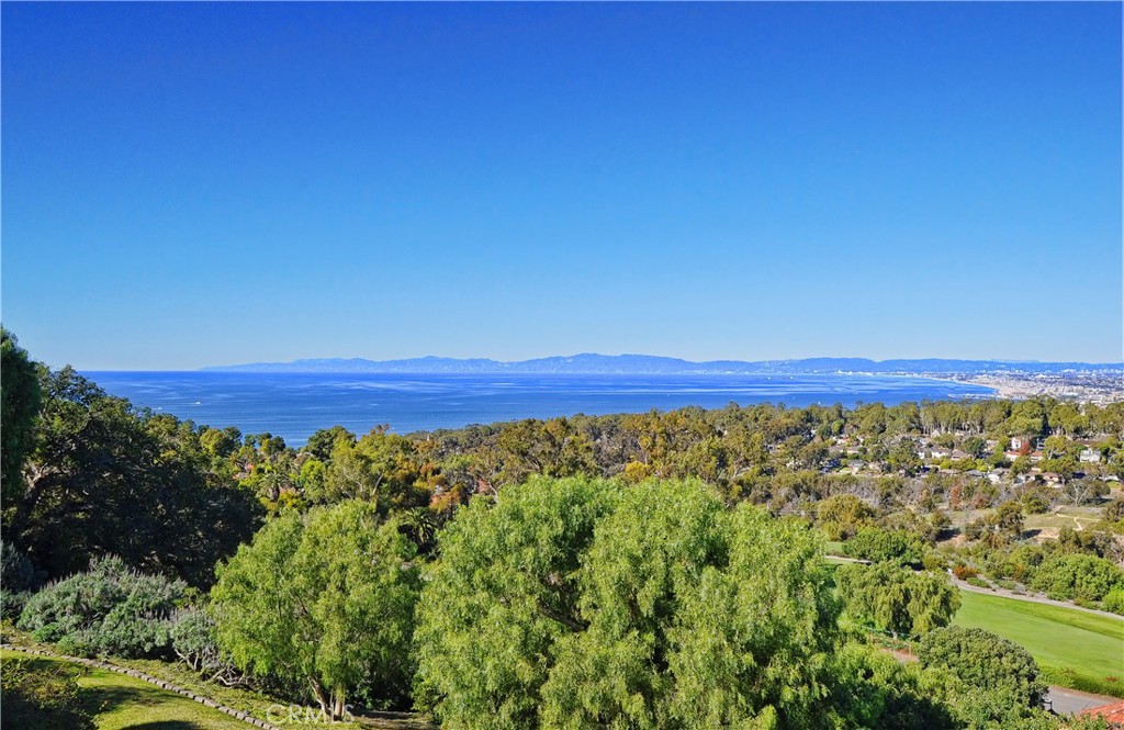 View! View! View! Breathtaking, yet tranquil, and on an extremely quiet street. This is the dream home that you have been waiting for! A magnificent Tuscan Villa with an excellent floor plan, perched atop the hill overlooking the Palos Verdes Golf Course with panoramic views of the ocean, coastline, city, mountains, and the entire LA Basin. The view changes all the time, like a living canvas in front of you. Features include a two-story foyer, luxurious living room, huge formal dining room, gourmet kitchen w/ adjacent family room, wood-paneled library, a wine tasting room, and media room. Custom wood and stone flooring throughout, custom pedestal cabinetry, tasteful use of granite, amazing ceiling detail, and multiple zoned air-conditioning. Home features include 7 bedrooms, 10 Baths, 5 fireplaces, 4-car garage, 3 stop elevator, pool with infinity spa, fire pit, and tons of exterior patios and balconies making it the perfect setting for entertaining. All on a quiet cul-de-sac street with about 26,500 sq. ft. lot. It has mature landscaping and offers a bonus parking area. Property is fenced, gated, and centrally located with easy access to the Westside, any beach cities, or PV center. This extraordinary home comes with the location, size, VIEW, quality, and privacy...truly a rare opportunity! Some pictures are virtually staged.