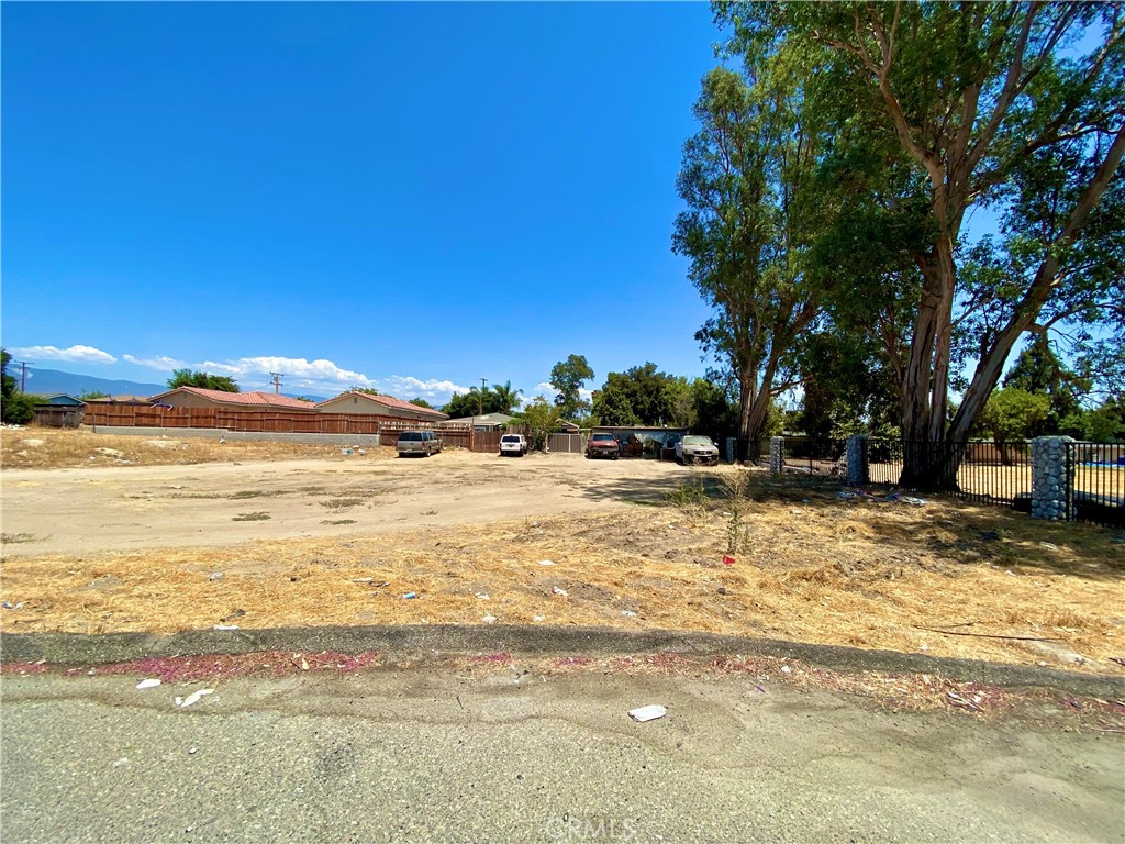 What an amazing opportunity! Lot is in its own cul-de-sac in a residential neighborhood perfect to build your dream home or future flip on! Across the street from Arroyo Valley High School and close to other schools this family friendly area is perfect! Great access to the 215 and 210! Food, banks, shops etc are down the street! Don't let opportunity pass you by! Please be advised, the land pictured is five parcels, only one parcel equaling 5,155 sqft is part of the sale.