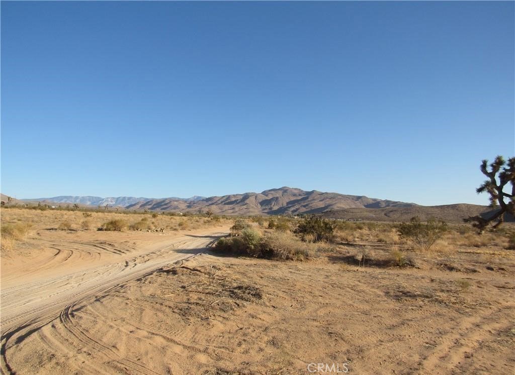 There is not an address associated with this parcel. What is reflected is the Parcel# 0464-022-32-0000 which is +/-5 Acres. Zoning is RL-20. Located in Unincorporated San Bernardino County in the area of Fairview Valley near the Town of Apple Valley. Dirt road access via Oldenburg Rd. The South ½ of the Southwest ¼ of the Southwest ¼ of the Southwest ¼ of Section 27, Township 6 North, Range 2 West, San Bernardino Base and Meridian, in the County of San Bernardino, State of California, according to the Official Plat thereof. Excepting therefrom certain mineral rights, as reserved in the Deed from the United States of America, recorded May 16, 1949, in Book 2402, Page 561, of Official Records.