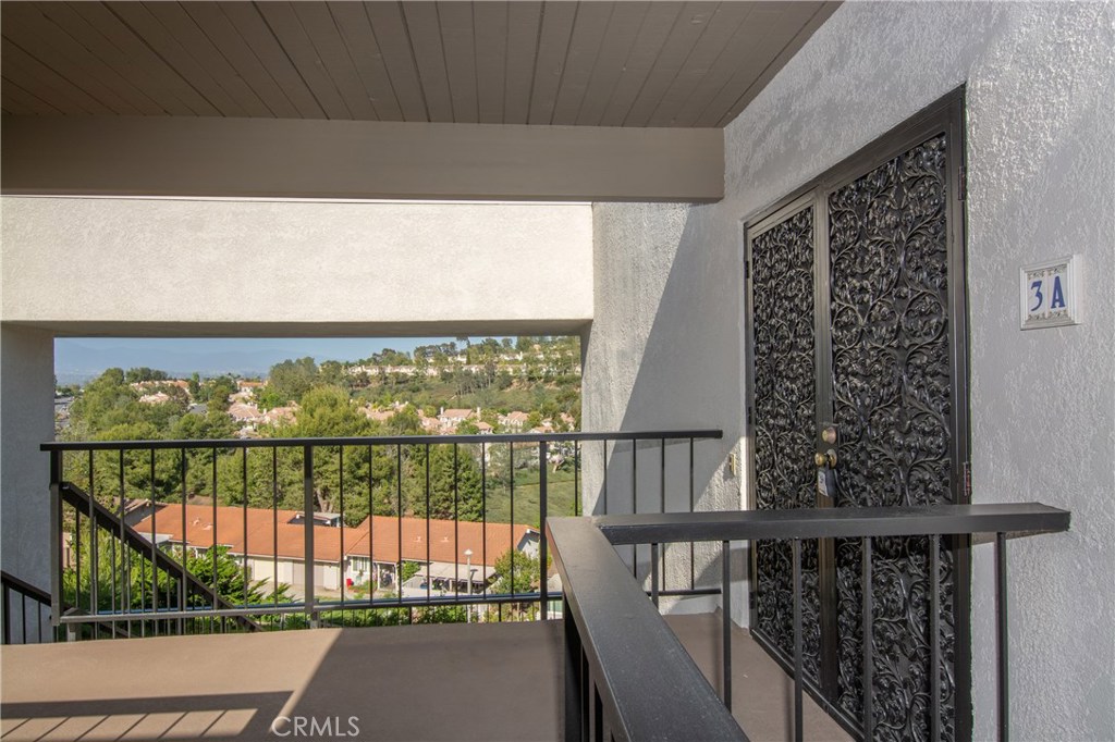 Don't Miss this Spectacular Panoramic View Home! MORE PICTURES COMING SOON. This large end unit is located on the top floor of a three-level building. As you enter this beautiful home you are greeted by its incredible views. This home features 3 bedrooms and 2 baths, including a generous master suite, a spacious living room, dining area and an enclosed balcony for your enjoyment. Features include a double door entry, crown molding, brand new carpet, custom paint and much more! Subterranean parking with abundant storage is located under the building with easy elevator access. Enjoy Laguna Woods Village a 55+ resort life-style community with 27 hole championship golf course or the 9 hole executive par 3 course, tennis, paddle tennis, lawn bowling, 2 fitness centers, 7 clubhouse, 5 swimming pools, equestrian center, theater, library, and so much more. With all the social clubs, activities and bus service in and around Laguna Woods, this Country Club living ensures you will never get bored here!