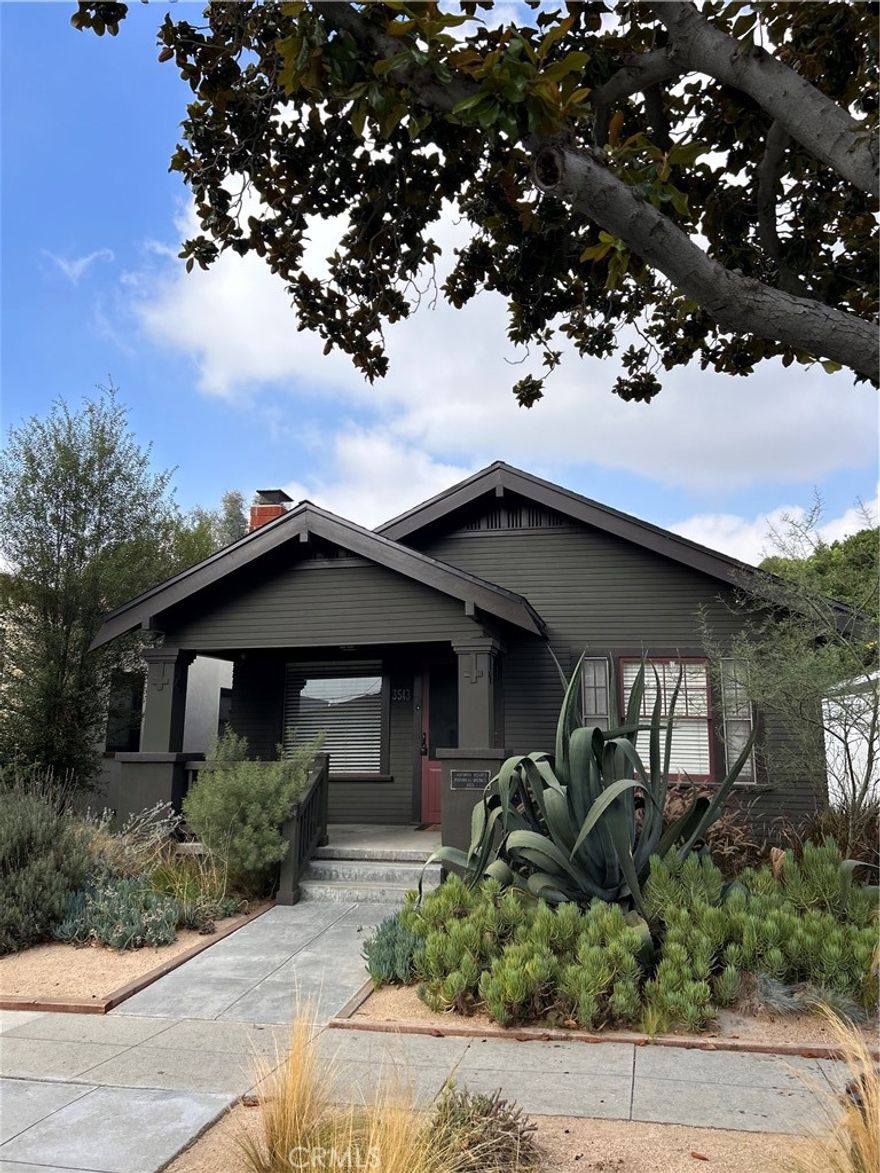 CRAFTSMAN CHARM! CAL-HEIGHTS DESIRABILITY! TURN-KEY CONDITION! 3 Bedroom, 2 Bath historical home in the heart of California Heights. Step into this 1925 Craftsman home and you will fall for its understated style, worm hardwood floors, and the many little details that distinguish this classic California style. The living room features cozy wood-burning fireplace, tall wood bookcase, and lots of windows to let in ample natural light. The dining area is lovely with built-in buffet with mirror. The huge kitchen has a pantry, garden window , long counter for meal prep, laundry and room for a table. The primary bedroom has a walk-in closet and is adjacent to a newly remodeled 3/4 bath. In the main hallway you will find a bult-in desk, linen storage the other 2 bedrooms and a full bathroom. While this home maintains the integrity of it’s Craftsman style, it has been updated with air-conditioning, new electrical, ne plumbing and a brand new roof. In the rear of the house is a generous yard with areas to entertain, grow some vegetables, and more! The one car garage or as it was originally called, carriage house, has a brand new garage door with access off the alley. With-in walking distance of award winning schools, Bixby Knolls shopping and dining district, and nearby access to the 405 & 710 freeways.