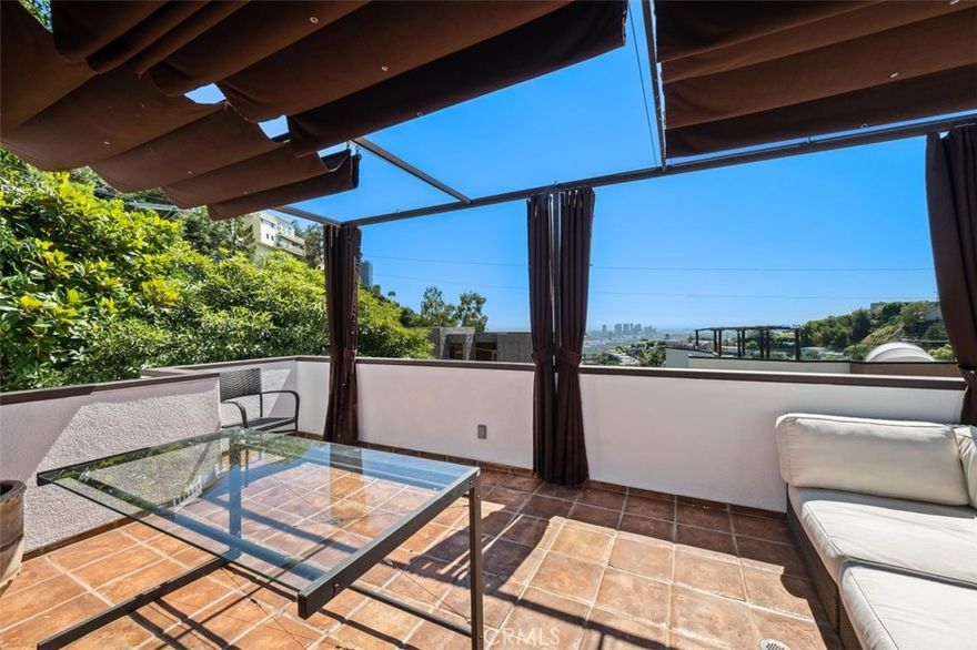 Nestled in storyland this Mid-century ranch home invokes Hollywood’s Golden Age.  Sunset Plaza has for decades been the prime example of the quintessential LA lifestyle.   Imagine yourself climbing north from the heart of Sunset Boulevard to your new home.  Thanks to it’s address this beautiful 3 bedroom 4 bath home is blessed with jetliner views. There is also a bonus junior suite with attached to the garage which can be imagined as a studio, editing bay, and/or space for your overnight guests. Lovingly upgraded to showcase the era’s unmatched craftsmanship.  New paint inside and out, upgraded kitchen, new electrical, new landscaping, and so much more.  There are multiple nooks to escape and find your Zen.  The outdoor garden retreat can be used as a yoga sanctuary or enjoyed with friends in the beautiful evening air.  Sit under a shady tree in the eastern courtyard and enjoy a good book. The upstairs prodigious suite has a balcony ideal for entertaining as well. Here is where the sky will wow you.  Make an appointment to see it today and experience this gem in the hills…