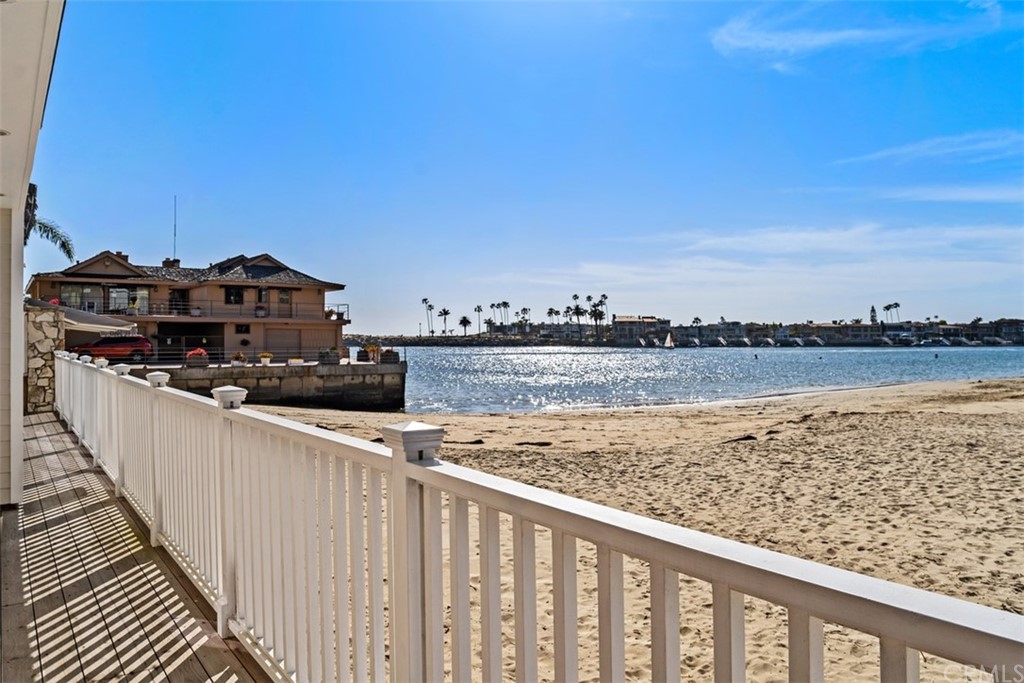China Cove- a very special, little known slice of heaven in Corona del Mar. 2709 Cove Street is a 3 bedroom 3 bathroom home, rebuilt from the seawall up, including electrical and plumbing in 2012. This property has 60 feet of beach frontage from which you can enjoy bay, harbor and sunset views every day of the year. Imagine the beach immediately in front of your door! Launch your SUP right from your front yard. The main floor has a spacious living room, kitchen and powder room. Enjoy socializing in front of the fireplace while watching the ever changing marine activities on the bay. Upstairs is the master suite with shower and deep soaking tub,and 2 additional guest bedrooms and bathroom. You have a 2 car garage with direct access into the home. Also located here is a beach shower and laundry. There is also precious additional parking in front of the garage. This home could not be built in its current size and scope today. It is an easy walk into the Village ...where you will find shops, cafes, and restaurants to enjoy. Only a handful of people are lucky enough to call China Cove home...are you one of them? Seller is a licensed agent in the state of California, but acting as a principal. Buyer to cooperate in the seller's 1031 exchange at no cost to the buyer. Broker/Agent does not guarantee the accuracy of square footage, lot size, zoning, rent control, permits, use code, schools, and/or other information concerning the conditions or features of the property provided by the seller or obtained from public records or other sources. Buyer is advised to independently verify the accuracy of all information through personal inspection and with appropriate professional.