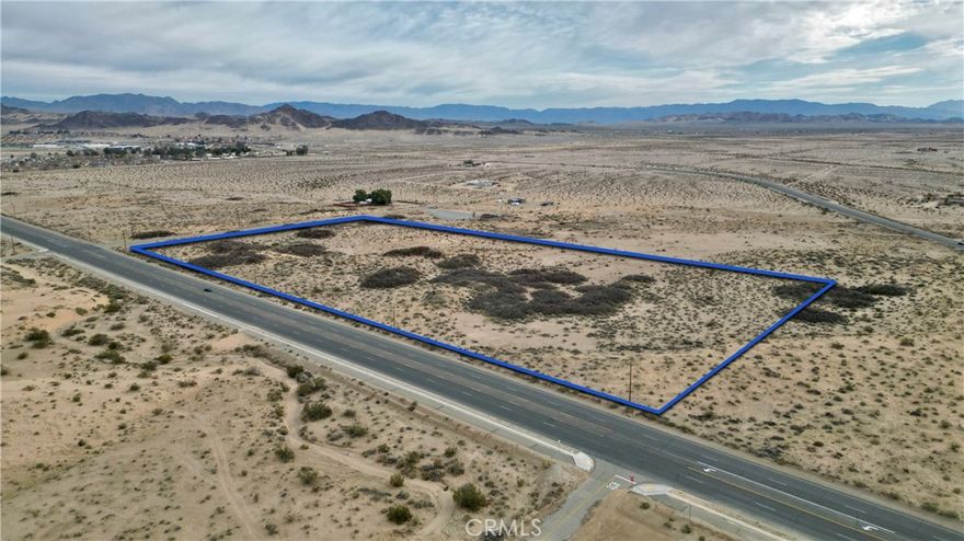 Welcome to an exceptional opportunity to own 18.19 acres of residential bliss nestled in the heart of 29 Palms. Spanning over 18 acres, this vast parcel provides ample space for realizing your vision. Whether you're considering building your dream home, establishing an equestrian estate, or crafting a serene getaway, this property offers the canvas upon which to create. Conveniently situated as a corner lot, this expansive parcel offers a multitude of possibilities for your dream desert retreat. Its location in close proximity to the main entrance of the 29 Palms Marine Corps Base adds to its allure, providing easy access to the amenities of the base and the surrounding community. Ideal for military personnel seeking a peaceful retreat close to duty, this location offers both convenience and opportunity. Embrace the tranquility of the desert landscape, enhanced by mature vegetation that adds character and charm to the surroundings. Experience the beauty of native flora and fauna as you immerse yourself in the unique ecosystem of the Mojave Desert. Whether you envision a private sanctuary away from the hustle and bustle of city life, a recreational haven for outdoor enthusiasts, or an investment opportunity with promising potential, this vacant lot presents endless possibilities to suit your desires. Seize the opportunity to own a piece of paradise in 29 Palms. With its desirable location, expansive acreage, and natural beauty, this property is a rare find that awaits your personal touch.
