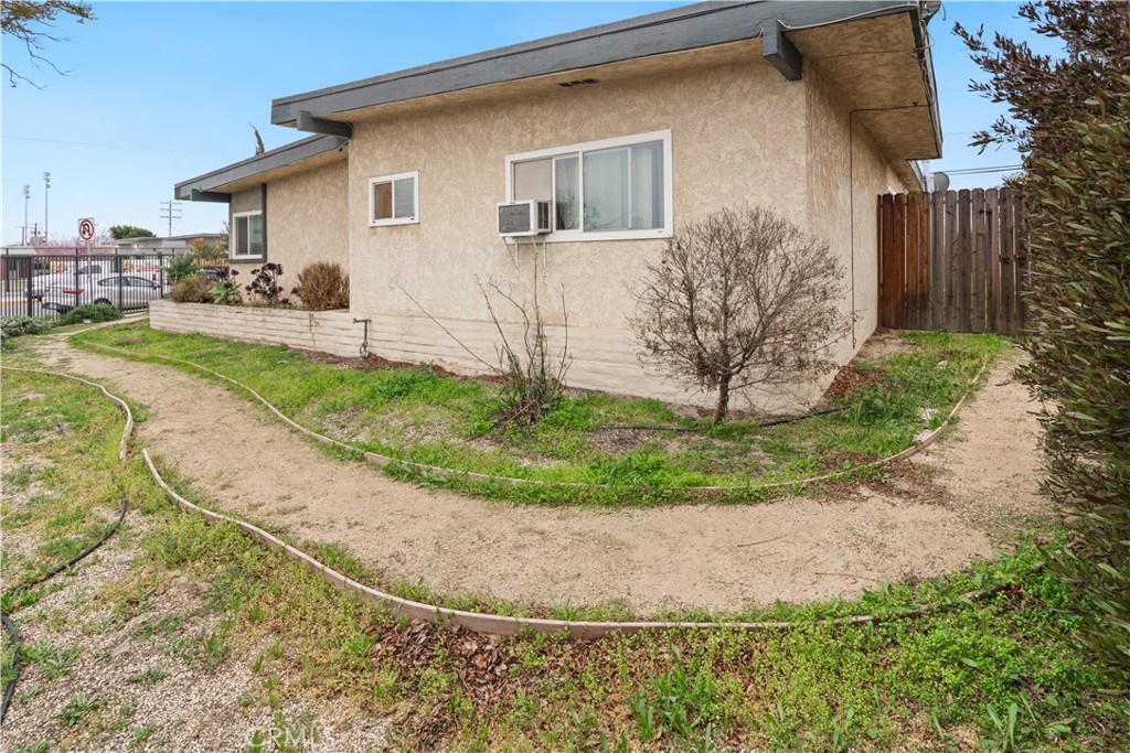 Here's your chance to acquire a fully occupied, income-producing triplex located in an Anaheim neighborhood. This single-story property offers excellent potential for both immediate rental income and future value-add through light renovations. All units are in fair condition features large, fully enclosed private patios - ideal for tenants and added privacy. Unit #1 Spacious 3- Bedroom, 2 bathroom Unit. 1320sqft featuring: a cozy fireplace, 2 car garage. Please note: this unit previously experienced a water leak, which has since been removed. The seller is currently addressing water damage repairs. Unit #2 the middle unit features 2 bedroom, 1 bathroom unit with 1,038sqft. This unit shares a 2-car garage with Unit #3. Unit #3 located at the rear of the property and attached to the shared garage, features: 2 bedroom, 1 bathroom unit offers 1,038sqft. Additional income is generated through a shared laundry area. This is an ideal investment for buyers seeking immediate income with long-term upside.
