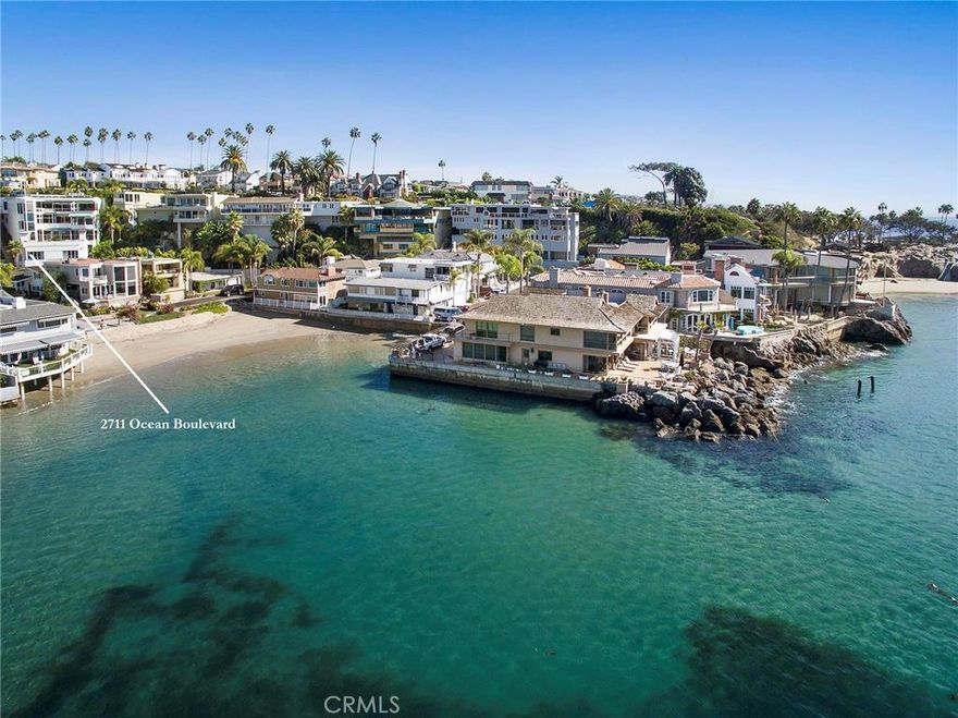 Prime rebuild opportunity. Contact listing agents for proposed floor plans and renderings from architect Chris Light of C.J. Light Associates. Uniquely located on the oceanfront bluff along Ocean Boulevard in the village of Corona del Mar, this home overlooks the channel and China Cove enjoying unparalleled views of the harbor, ocean, Catalina, and sunsets. With close proximity to both the village and the beach, no other property affords this special combination of space, lifestyle and exceptional views. The existing structure predates current limits on construction and could not be duplicated adding significant value to the property, making this an exceptional opportunity in the best location in Corona del Mar. Also. noteworthy is an oversize garage with lift parking for six cars.