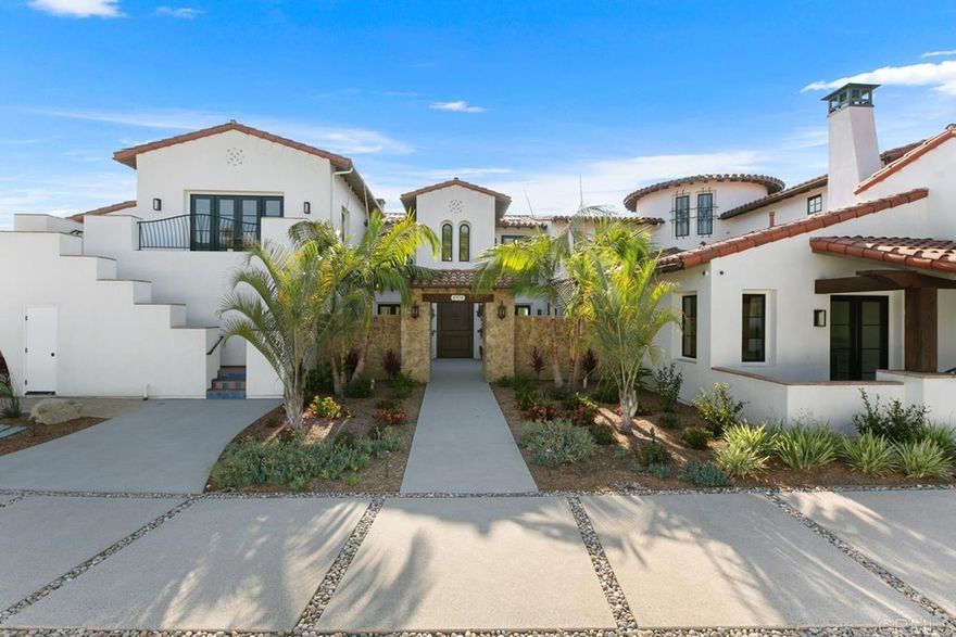 STUNNING NEW CONSTRUCTION (2020) IN MUCH DESIRED DEL MAR MESA WITH NO HOA OR MELLO-ROOS!!   Enjoy the finest in California coastal living high above Carmel Valley in this custom 2-story modern home with the highest quality upgrades and attention to detail.  Sweeping views of the valley and evening lights, with ocean and Los Penasquitos Lagoon views from the second-floor bar area and spacious third story deck.   Entering the courtyard, you’ll find detailed stonework and a grand entrance to the home through a custom oak door, greeting you with expansive views to the west, high ceilings, and an abundance of natural light!  Huge great room features custom oval chandelier, high open beam ceiling, and stone fireplace with adjacent built-ins.   Enjoy the breeze by opening the entire back wall of folding doors that lead you to a large covered outdoor room with Infratech ceiling heaters, a full wet bar and bar refrigerator, and a step down to your pool and spa.  Your backyard oasis also includes an outdoor bar area with another build in wet sink, BBQ, gas firepit, and a full pool bathhouse.  Gourmet chef’s kitchen features two large islands with built in microwave, dual dishwashers, farmers main sink and separate prep sink, insta-hot water, and lots of counter space.  Thermador 6 burner gas cooktop with gridle and pot-filler, dual ovens, oversized Sub-Zero side by side refrigerator, and Miele built in coffee maker.  Custom cabinets and backsplash, quartz counters and beautiful lighting.  A butler’s pantry with outside pass thru window, built in ice maker and walk-in stockroom offer lots of storage and convenience  Dining room offers open beam ceiling to match the great room, has another built in wet bar with custom cabinetry and 166 bottle wine refrigerator.   The master suite is a private oasis, located on the far end of the first level.  Fireplace and open beam ceilings, custom chandelier, and sliders to the back yard.  Custom stonework and more open beams await in the master bath with glass enclosed full body and rain & steam shower, lots of in shower seating, and separate jacuzzi tub.  An amazing walk-in closet with full size laundry and steaming station, with large center island and lots of customizable storage options.  Set with its own private entrance, the first-floor guest suite offers ample space, and features a mini-refrigerator, microwave, sink, and fireplace.  Full ensuite bath with dual sink vanity, custom tile, and fixtures.  Add to the already great entertainment options, a full theater off the great room with custom cabinetry and theater lighting.  Also featured on the first floor is a gym with rubber mat flooring, and half bath. Main laundry room with deep sink, and has plenty of cabinets, full size stack laundry, and leads to an enormous 5-car garage, prepped for TWO car chargers, with RV parking and dog wash station. Take the spiral staircase up to your second level bonus flat great for kids or another great relaxing space.  Don’t forget the hidden door that leads up to the bar area.   There are 3 bedrooms on this end of the home, all with large walk-in closets and ensuite bathrooms with custom tile and fixtures. There is another large balcony between two of the bedrooms, with full-size laundry room at this end of the home. The second-floor bar comes with a mini refrigerator, dishwasher, icemaker, wet sink, custom shelving, and drop-down lighting.  More of those stunning views await from the balcony off the bar area.   A private soundproof office is located on the south end of the upstairs space, complete with another ensuite full size bath and separate second level entry from the front.    The home is solar ready, has Saltwater pool and high efficiency pumps, multiple-zone HVAC systems, whole house central vacuum, imported tiles and fixtures, ceiling fans, lots of driveway parking, and many more features and comforts have been tucked behind this fully gated home. Public trails nearby perfect for hikin