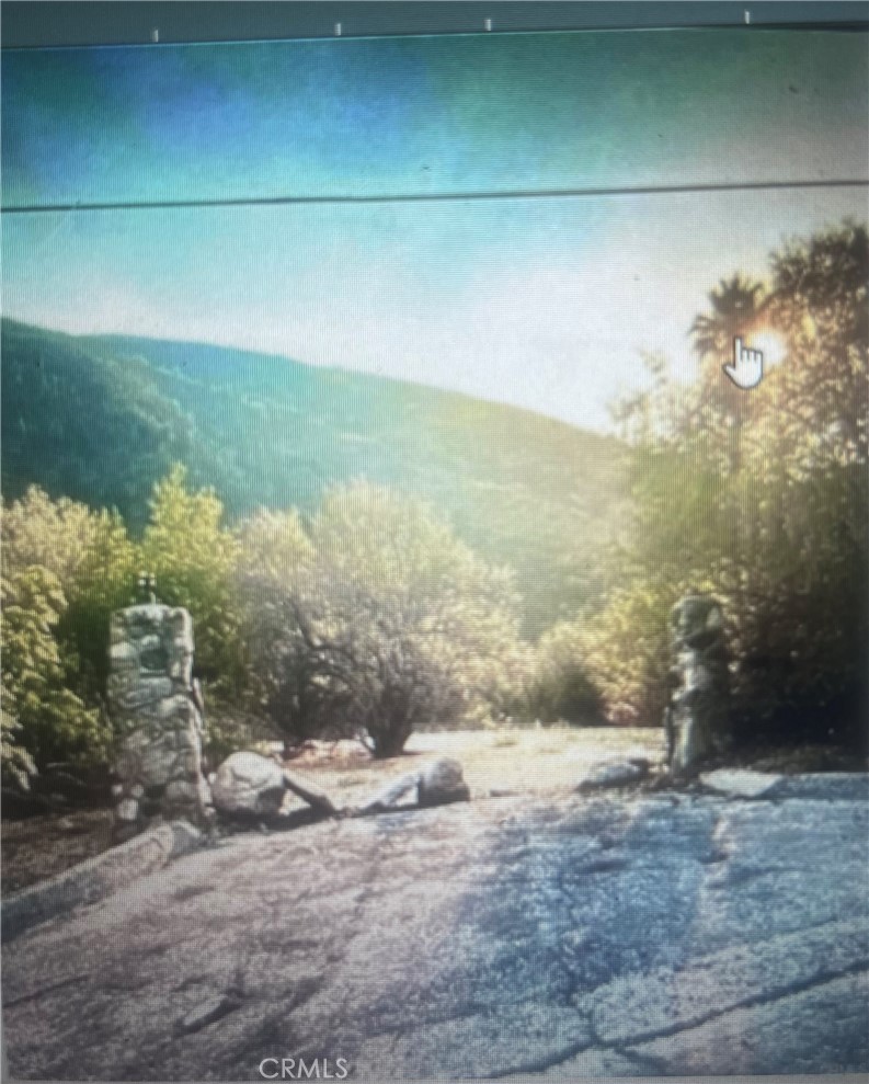 Gorgeous corner parcel tranquil mountain community. Build your dream home with a slight view of the valley. Parcel should have utilities there is a septic that no longer is useable due to 30 years of not being used. Buyer will need to do their due diligence regarding utilities and zoning and any concerns regarding future build and parcel. Seller with not carry.