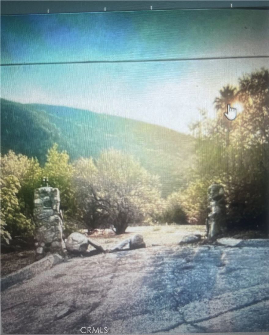 Gorgeous corner parcel tranquil mountain community. Build your dream home with a slight view of the valley.  Parcel should have utilities there is a septic that no longer is useable due to 30 years of not being used.  Buyer will need to do their due diligence regarding utilities and zoning and any concerns regarding future build and parcel. Seller with not carry.