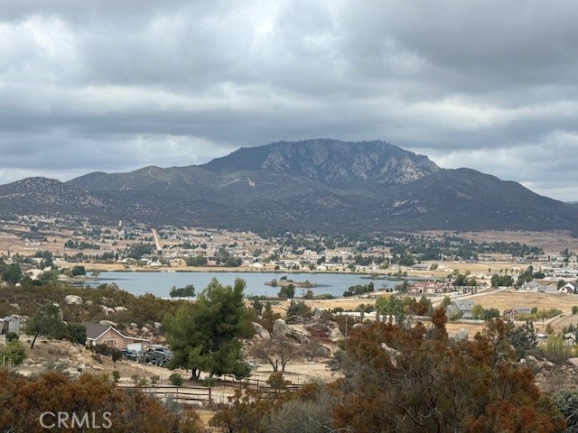 This stunning 2.81-acre parcel, perfectly situated at the end of a cul-de-sac in the gated community of Lake Riverside Estates. This parcel offers the ideal setting to build your dream oasis, complete with breathtaking panoramic views of the Palomar Mountains. Conveniently located near the Bradford Gate for easy commuting, this lot is part of a sprawling 52,000-acre equestrian-based gated community. Enjoy the many amenities, including a man-made lake, fishing, playgrounds, a pool, BBQ area, basketball and volleyball courts, and even a private airstrip. The roads are maintained by association, security and fire department on site. Don't miss this incredible opportunity!