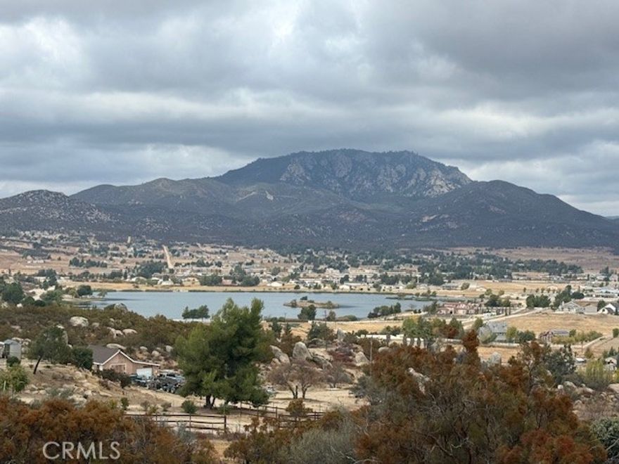 This stunning 2.81-acre parcel, perfectly situated at the end of a cul-de-sac in the gated community of Lake Riverside Estates. This parcel offers the ideal setting to build your dream oasis, complete with breathtaking panoramic views of the Palomar Mountains. Conveniently located near the Bradford Gate for easy commuting, this lot is part of a sprawling 52,000-acre equestrian-based gated community. Enjoy the many amenities, including a man-made lake, fishing, playgrounds, a pool, BBQ area, basketball and volleyball courts, and even a private airstrip. The roads are maintained by association, security and fire department on site. Don't miss this incredible opportunity!