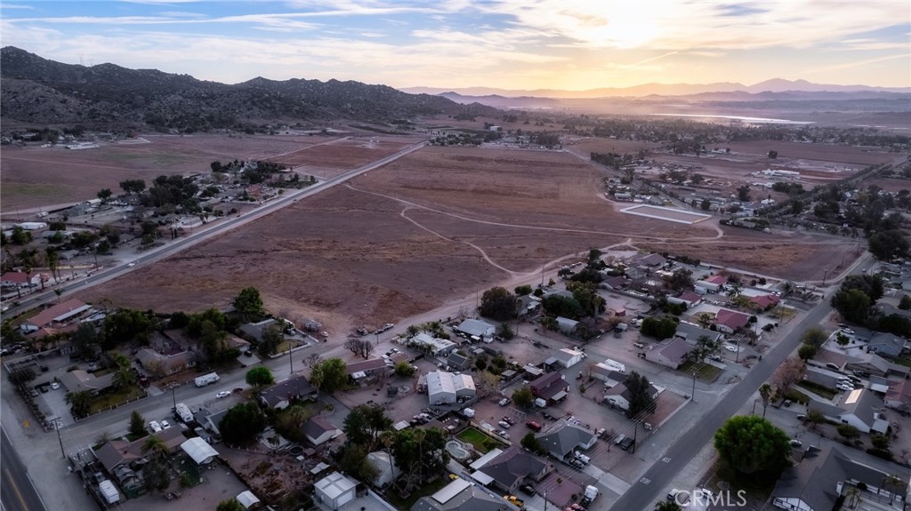 Awesome opportunity to build your dream home! This lot is located at 0 Converse, Merger 4: 1.12-acre parcel in the heart of Nuevo offers fantastic residential development potential. The property is mostly flat with some gentle slope, perfect for new construction or a permitted manufactured home, with room for horses. Enjoy stunning mountain views and plenty of space to make it your own. The seller completed percolation tests years ago for much of the subdivision. The property requires a septic system and well. While the lot has not been surveyed, images provide an approximate location. Adjacent parcels are also available for sale, each sold separately.Don’t miss this unique opportunity! CALL TODAY-MUST SEE!*Seller financing available with a 35% down payment, an 8% interest rate, and a 2-year term.