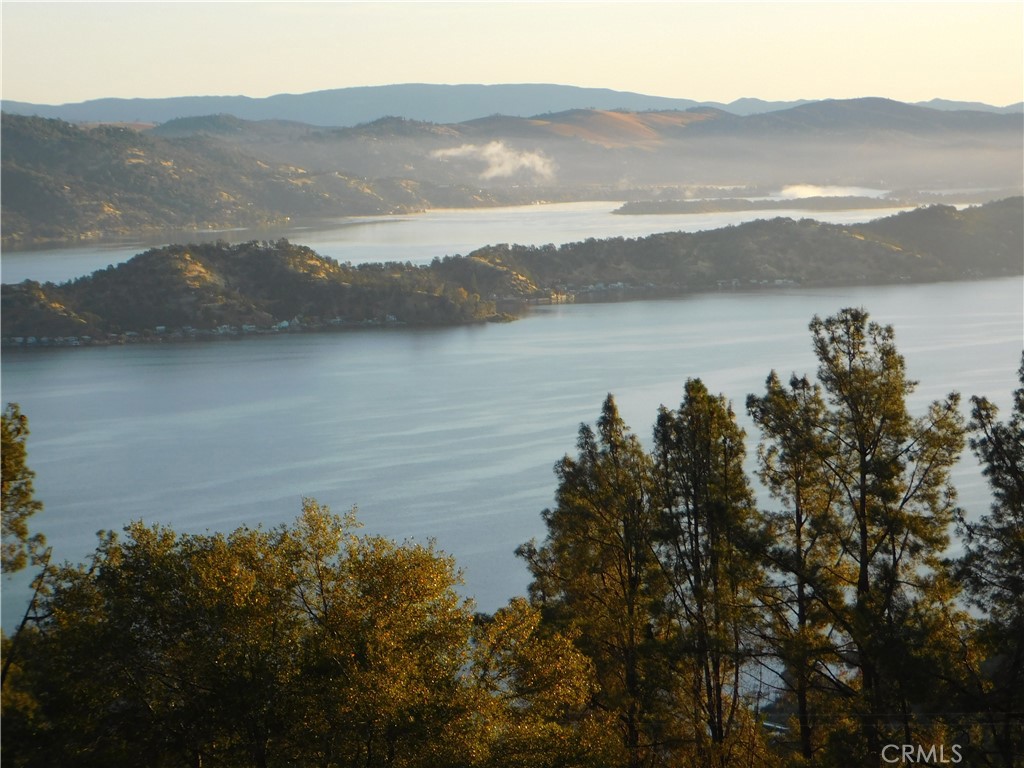 An amazing lakeview parcel with panoramic views of the lake, the mountains, vineyards and more! Almost 2 acres in the very desirable Riviera West Community of Kelseyville. Riviera West is known to have the absolute BEST views in the county. All home and land owners also have access to the community pool, picnic area, boat launch and dock. If you are looking to build a true California Dream home then this could very well be the best spot. Come check it out today and be prepared to have your mind blown with the spectacular natural splendor all around you. Owner willing to carry.
