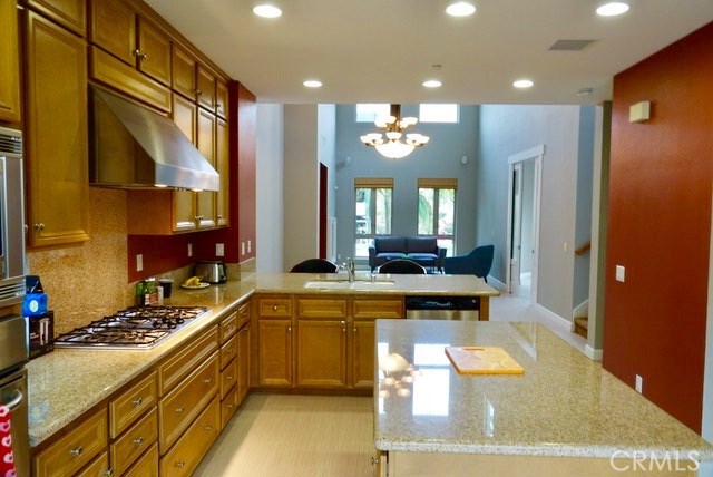 Available for move in 4/1/2018. Highly desirable Vantis condo. Aliso Viejo Town Center location at "City Walk". Cosmopolitan living at it's best. What a great place to live/work near 73 toll road. Very spacious Master bedroom on 3rd floor with a walk-in closet and large master bath. 2nd floor features : Large kitchen with a center island, granite counter, and stainless appliances. Open living/family area that overlooks dinning room and kitchen. Newly remodeled room of living/family room that can be used as an extra bedroom/office/playroom. Attached 2 oversized car garage with built-in-cabinets with plenty spaces for extra storage. This community offers an association club house, recreation room, billiard room fitness center, business center, BBQ's pool and spa. Washer/dryer /refrigerator included. *****THE OFFICE PORTION OF THIS CONDO HAS SEPARATE ENTRANCE ON THE 1ST FLOOR IS NOT INCLUDED IN THIS LEASE******