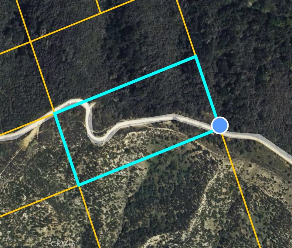 Open undeveloped 5 acres of land with two flat areas. Beautiful Yucaipa mountains all around. Close to the city.