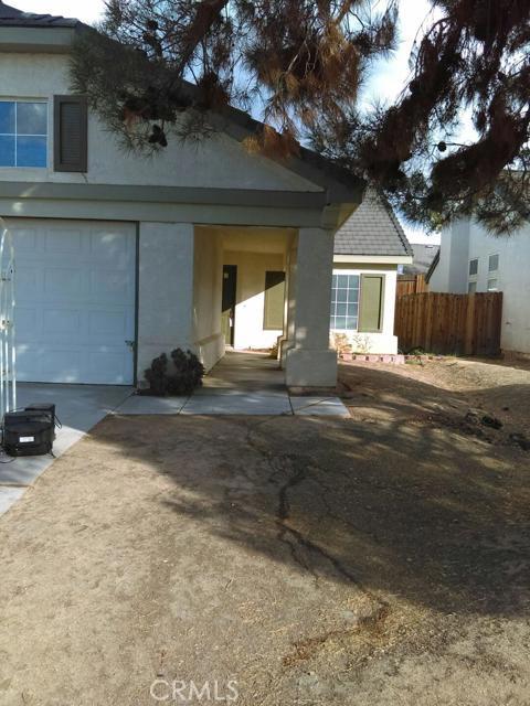 Cud De Sac House in desirable neighborhood; Features 4 Bedrooms 2 Baths, Indoor Laundry Room, Family Room w/Fire Place and Separate Living Room. Association Amenities: None # of RV Spaces: 0NONE Lot Location Type: Standard Location Special Features: None # of Attached Spaces: 2 # of Detached Spaces: 0
