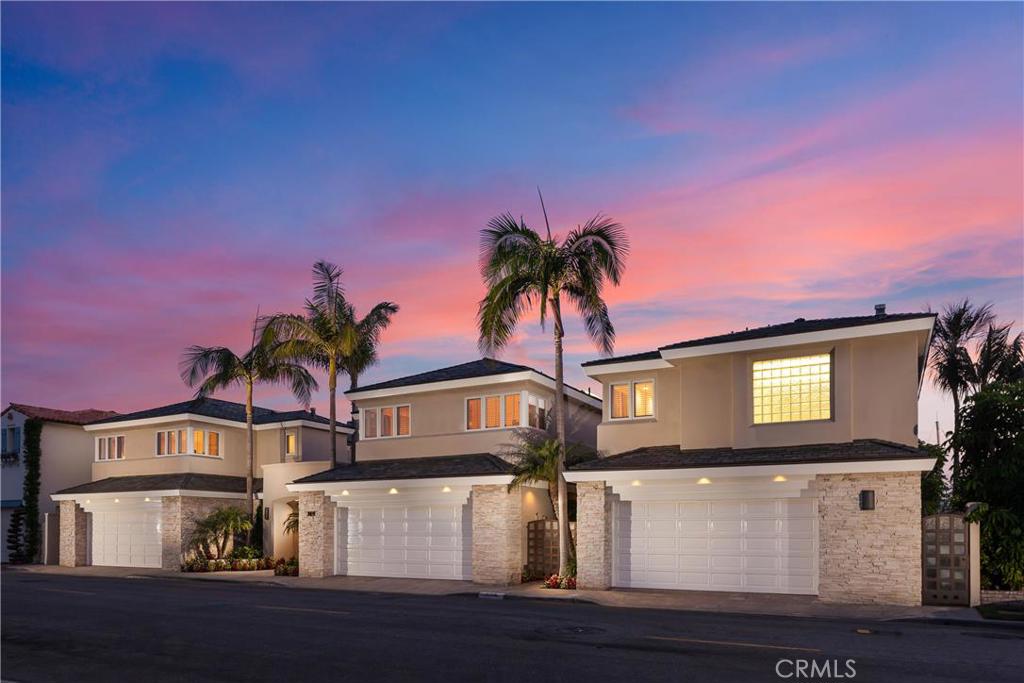 Situated on 3 lots and over 100 feet of continuous waterfront on exclusive Lido Isle, this one of a kind, home affords classic elegance in its design and architectural elements. From the light and lush courtyard entrance, with over 8000 sq. ft. of indoor living space (including guest house), this home showcases spectacular views of the channel outside. The main house is overflowing with amenities including a gourmet kitchen, an extra-large island, and extensive counter and cabinet space perfect for preparing casual dinners or hosting large parties. The flow throughout encompasses the best in waterfront living, creating a soothing and peaceful retreat in your own home. Take the elevator upstairs to discover a 1500 sq. ft master, complete with 3 closets, his and her vanities, Jacuzzi tub, shower, an exercise room, and a private office with water views. There are 3 additional bedrooms, a game room, formal dining and living areas, two 2 car garages and a gorgeous outdoor poolside kitchen. The guest house affords a third 2 car garage and an immaculate and spacious 1 bedroom, 1000 sq. ft. apartment above, with a balcony, with a view of the bay and its own kitchen, dining and living room, with views of the pool, spa and channel.