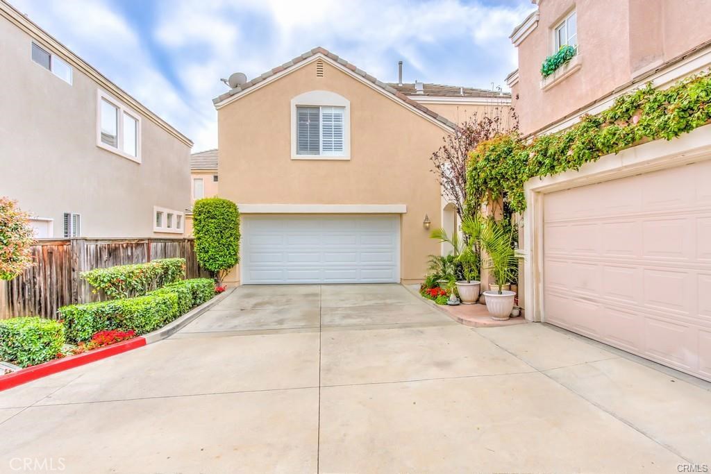 Nestled in a prime, corner courtyard location, this beautiful home offers 3 spacious bedrooms and 2.5 bathrooms with an enchanting patio that welcomes outdoor living and entertaining. The open layout of the main level features a remodeled kitchen with trey ceiling and recessed lighting, tumbled stone counter tops, stainless steel appliances, large pantry, a cozy living room with a fireplace and a separate dining area. The upper level boasts a large master suite with walk-in closet and 2 spacious secondary bedrooms w/mirrored wardrobe closet doors. All bathrooms have been updated and upgraded. Rich wood laminate flooring, newer upgraded carpet, custom baseboards and crown molding, wainscoting, plantation shutters, ceiling fans, custom paint colors, upgraded hardware, added under stairs storage with lighting and newer appliances, water heater and toilets. 2 car garage with storage and driveway. True pride of ownership. All you have to do is move-in and unpack. Enjoy the community pool and spa and the abundance of Foothill Ranch amenities featuring numerous parks, hiking and biking trails, shopping, dining and entertainment. Award winning schools.