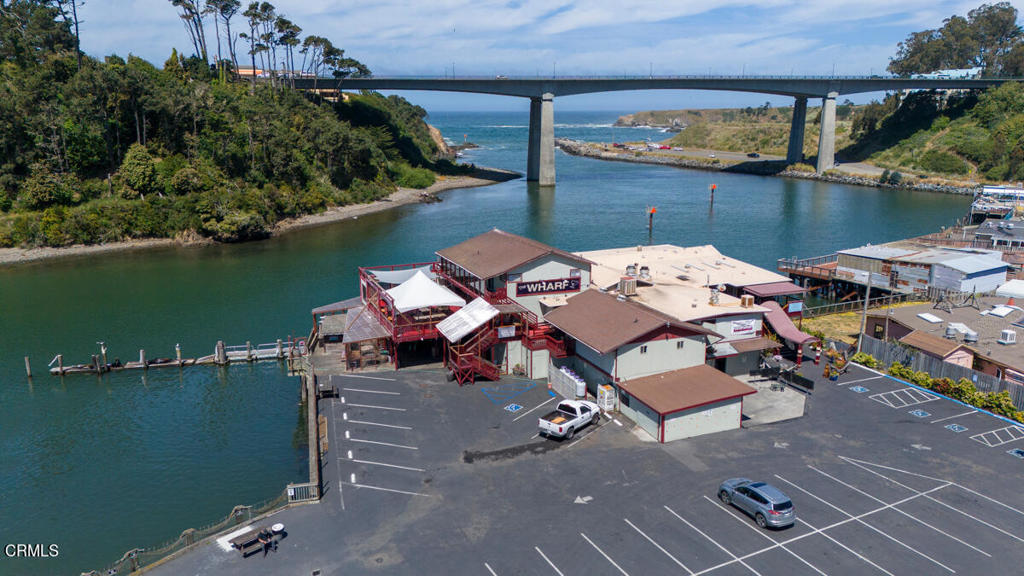 The Wharf restaurant and Anchor Lodge. The Wharf has been a destination for tourists and local for decades. Owner to retire and turn this unique property over for the next chapter. located in the heart of Noyo Harbor commercial and fishing area. In the county of Mendocino with Fort Bragg city water and sewer service. Three separate parcels. all with river frontage, and dock area. The restaurant building is home for the restaurant and lounge area, five river front motel units, and the Penthouse unit above the restaurant This has been used as an owners living unit and conference room. The Anchor Lodge also has a two story building with 12 motel units. Restaurant Bar and Motel available separately with lease and option possible on the real estate. Terms to be negotiated.