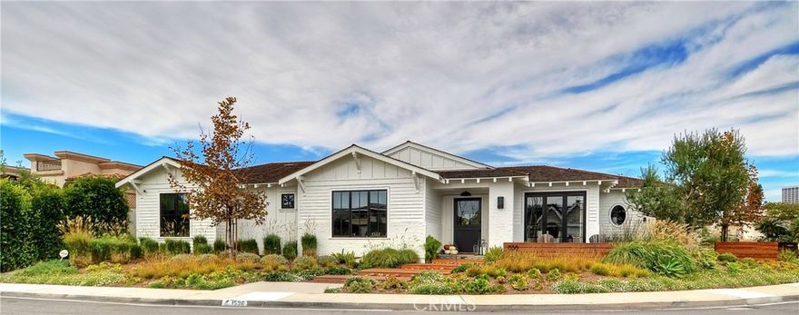 1536 Dolphin Terrace is an eclectic, perfectly executed mix of the finest in Coastal California design. Seamless indoor outdoor single level living is what Irvine Terrace in Corona Del Mar is all about, and this home has it covered. The property, built in 2014, includes 4 large en suite bedrooms and 4.5 baths, plus media room, set on an wonderful 11,074 sq ft. lot.  Surrounding the home are coastal arid plantings that set off the home beautifully. The property is both comfortable on the eyes and functionally exquisite. The family kitchen has two islands and top of the line everything, Blue Star, Meile, Sub Zero, etc... There's a modern twist on this classic design which includes gloss shiplap and barnwood walls, beautiful wire brushed wide plank floors, amazing old sourced barnwood doors, cutting edge wall coverings, lighting, and on and on. Huge pocketing walls of glass in the great room and master create a seamless flow, inside and out. The beautiful master suite and great room open out to the spacious back gardens which includes a gracious spa with water feature, fire pit with a conversational banquet, outdoor kitchen, star gazing and room for everyone. In Irvine Terrace, just beyond your home everything is at you fingertips.