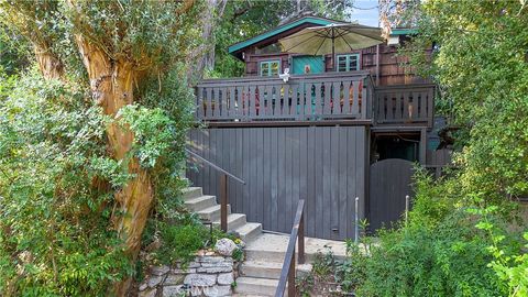 Photo of 10423 Scenario Lane, Bel Air, CA 90077 (MLS # PF23184405)