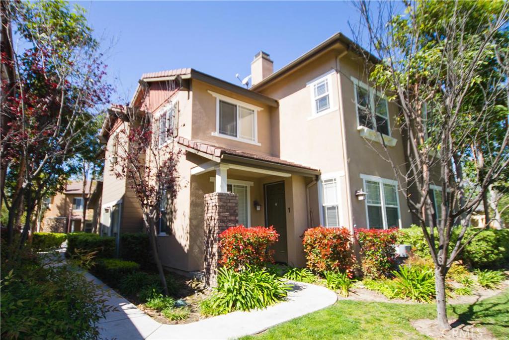 Fantastic opportunity to buy a 3 bedroom under $500,000 in highly desirable Ladera Ranch! This Chambray tract 3 bedroom, 2.5 bath, 2 story end unit townhome is freshly painted & ready for you to move right in. This Bright and open floor plan features a living room with fireplace, opening to the kitchen & dining area, great for entertaining family & friends in your home. The spacious kitchen features maple cabinets with lots of storage & a breakfast bar area. A Built in desk off the kitchen makes a great place for studying or a home office. All 3 bedrooms are light & bright with newer carpet & fresh neutral paint. The master bedroom includes a spacious walk in closet & private bath, complete with dual sinks & shower tub combo. The secondary bedrooms are light & bright, with paneled closet doors. There is an Inside laundry area for a stacked washer/dryer & a 2 car attached garage. The front patio opens to a grassy area, giving a nice open feel. Enjoy the Chambray community pool, as well as all the Ladera Ranch amenities, such as the many parks, clubhouses, tot lots, water park, dog park, tennis courts, & hiking trails. Just a short walk to the Bridgepark Plaza Shopping Center for dining & shopping too!